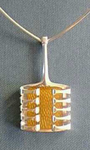 'Bjørn's Silver Harp',
pendant by Bjørn Sigurd Østern,
silver with enamel, 1966.