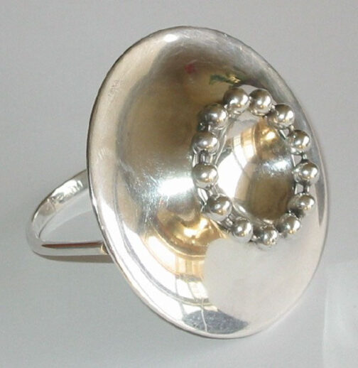 Pearly bracelet by Owe Johansson, in and for his own studio. Eruptive design of silver pearls on a ring of silver, pointing into Scandinavian MCM Jewelry.