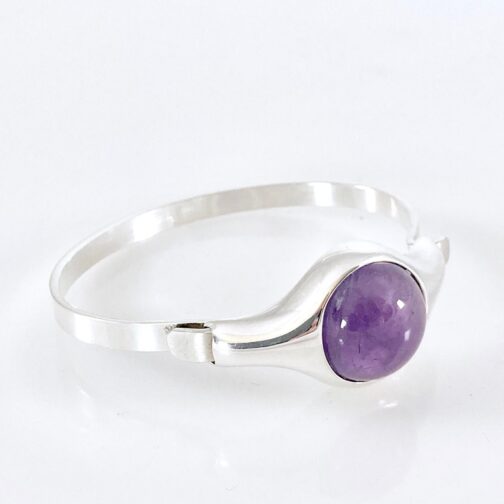 Silver with amethyst bracelet by Astri Holte presenting clear lines and the practical thought-throughness of Scandinavian Mid Century Modern Jewelry.