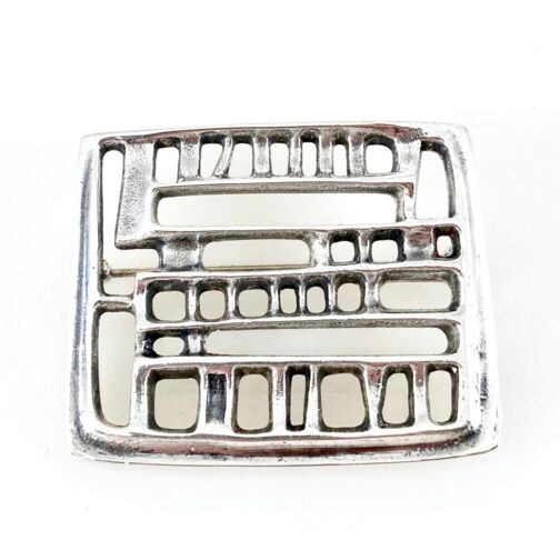 Modernist silver brooch by Bjørn Sigurd Østern for David-Andersen. Playful shapes and forms assure of history, and point to the future of MCM jewelry.