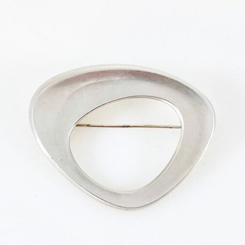 Industrial style silver brooch by Bjørn Sigurd Østern for David-Andersen (1962) showing close links between the Norwegian and Danish MCM Jewelry traditions.