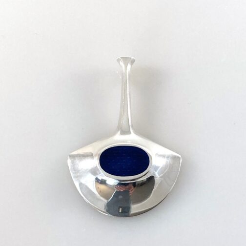 Bjørn Sigurd Østern pendant in silver with deep blue enamel. This piece is from the Silver Series of 1966 featuring 15 pieces of Silver jewelry, some with were made with contrasting enamel (SS66). David-Andersen's production of progressive Scandinavian MCM Jewelry for a new era.