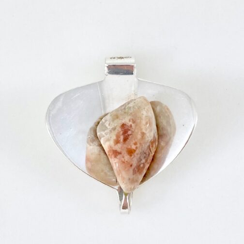 Elegant Silver Pendant with Agate by Erling Christoffersen for PLUS. A classic Christoffersen design, setting the silver as a mirror for the Agate stone.