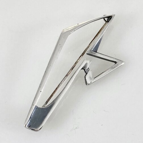 Brooch by Gudmund Elvestad for J. Tostrup. It's brutalist style crafted in silver for Norway's no. 1 purveyor of amazing Scandinavian Mid Century Modern Jewelry places it as a major exponent of the producing company and the era.