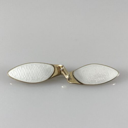 Propeller brooch by Grete Prytz, silver gilt with enamel. Her design resembling a propeller or a bow-tie from this MCM gigant designer.