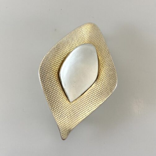 Silver with enamel brooch by Grete Prytz Kittelsen, in her famed "With Points" series. Scandinavian Mid Century Modern Jewelry from a master.
