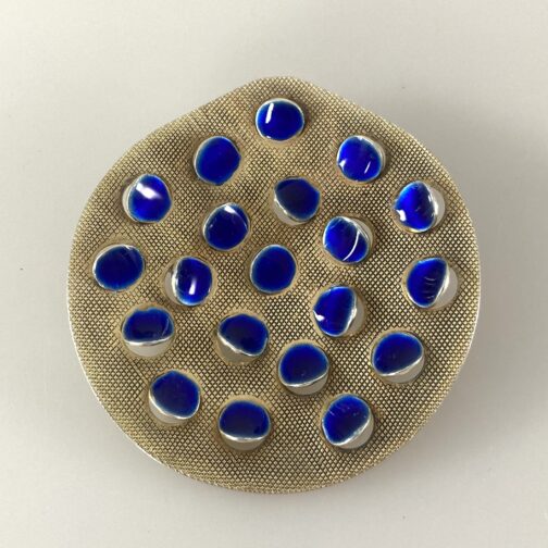 Blue enamel With Points brooch by Grete Prytz Kittelsen; one of her best known designs. A play with shapes, light and darkness; silver gilt with enamel.