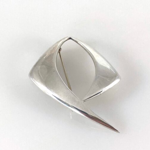 Silver brooch by Gine Sommerfelt for J. Tostrup. Powerful expression from this widely acclaimed Scandinavian Mid Century Modern Jewelry designer.
