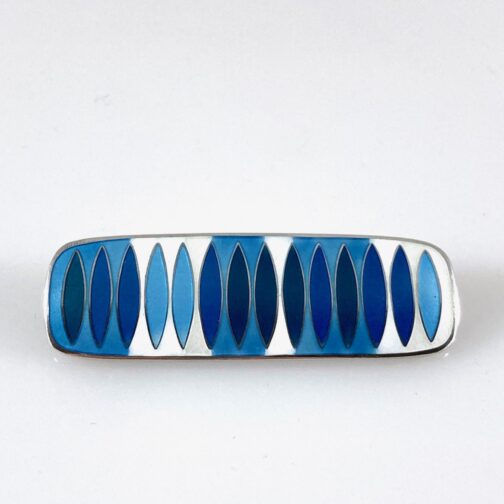Blue brooch by Hannelore Sorge in matte enamel, in Sorge's very distinct style making a weighty contribution to Scandinavian Mid Century Modern jewelry.