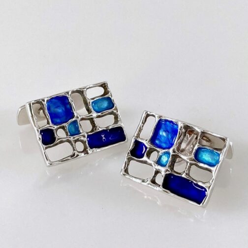 Cufflinks by Karl Jørgen Otteren for David-Andersen. The series is made in several colour schemes, this is the blue version. Scandinavian MCM with a twist.