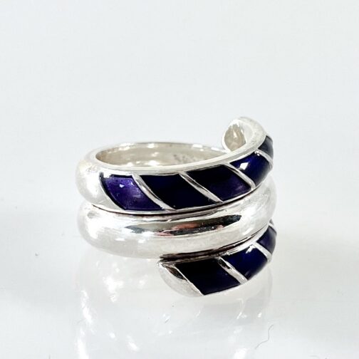 Ring by Toril Bjorg for David-Andersen. Her classic design made in several colour schemes, here in a purple/blue version.