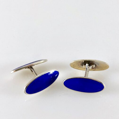 Cufflinks by J. Tostrup, in silver with deep blue enamel. Classic design pointing towards the modern era. Norwegian MCM jewelry from one of the best!