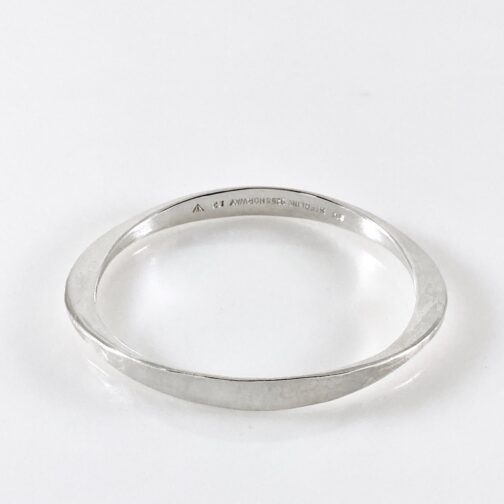 Bangle bracelet by Tone Vigeland for PLUS and Norway Silver Designs. One of her classic, best known, and most loved creations of MCM Jewelry made during her PLUS years. The simplicity has inspired many in it's organic twirl.