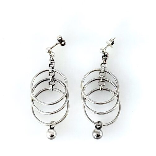 Tone Vigeland RINGS earrings for PLUS. Discover elegant Tone Vigeland earrings for PLUS. Her simple design of rings put together for a kinetic piece of pure elegance.