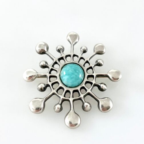Brooch/Pendant by Unn Tangerud; her well known "Unn's Snow Crystal" design, with an Amazonite set in silver. From the 1964 Troll Series "The Stone Series".